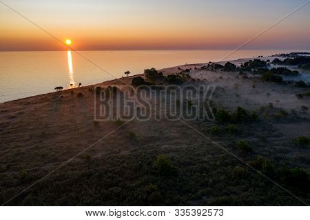Stone Wall On The Baltic Sea In The Summer. Osmussaar Coast, Island In Estonia, Europe.