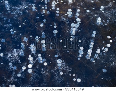 Texture Pattern Background White Winter, River Ice Air Bubbles Stagnant. Drawing On Ice Frost Formed