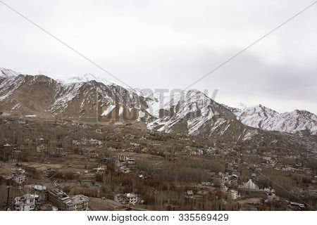 View Landscape And Cityscape Of Leh Ladakh Village With High Mountain Range From Viewpoint Shanti St