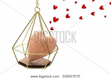 The Red Small Hearts Overflow Around The Pink Heart Enter The Gold Cage, And Fly Upwind.on White Bac