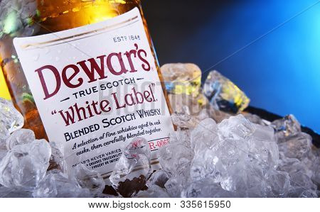 Bottle Of Dewars Blended Scotch Whisky In Bucket With Ice