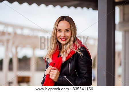 Slylish Trendy Hipseter Girl With Red Kiss Lips In Rock Black Lether Jacket Outdoors In The City