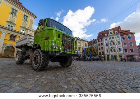Bautzen, Germany - October 10, 2019: City Hall Square And A Medium-duty Truck Ifa W50 In The Foregro