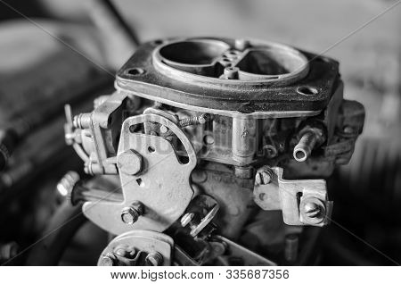 Close-up Of A Car Gasoline Carburetor. Carburetor Without Top Cover. Without People. Selective Focus