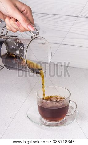 Eady Coffee Brewed In An Alternative Way In A Funnel V60 Is Poured Into A Cup.