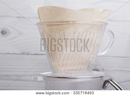 New Filter For Subsequent Alternative Brewing Of Coffee In The Funnel V60 Close-up.