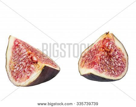 Two Slices Of Purple Fig Isolated On White Background With Copy Space. Soft, Sweet Fruit, Skin Is Th