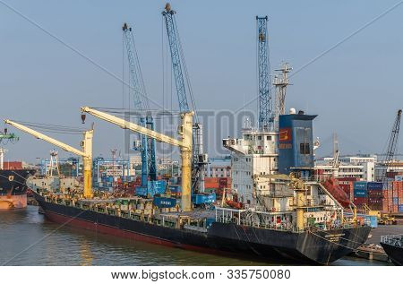 Ho Chi Minh City, Vietnam - March 13, 2019: Tan Thuan Port On Song Sai Gon River At Sunset. Biendong