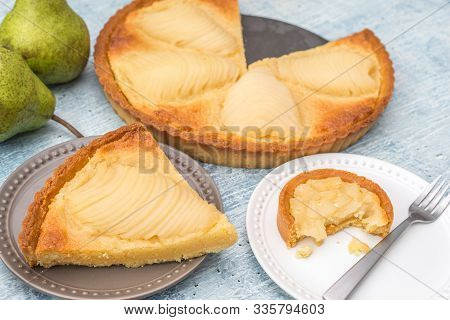 Delicious Home Bake Poached Pear Tart Pie, As Known As Tarte Bourdaloue, A Cup Of Coffee Latte. It I