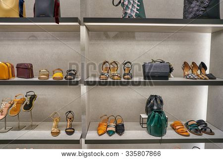 SINGAPORE - CIRCA APRIL, 2019: goods on display at Charles & Keith store in The Shoppes at Marina Bay Sands. CHARLES & KEITH is a Singaporean fast-fashion footwear and accessories retailer.