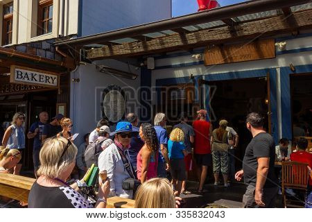 2016, February 14 - Queenstown, New Zealand, People In A Queue Waiting For The Fergburger The Most P