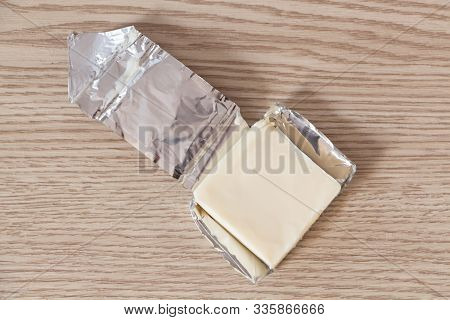 Open Portion Of Processed Cheese With Emmenthal