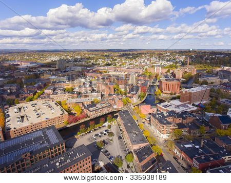 Lowell Historic Downtown, Canal, Marrimack River And Historic Mills Aerial View In Fall In Lowell, M