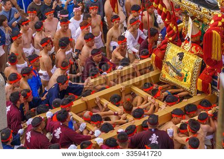 Himeji, Japan - October 14, 2019: Portable Shrine Carried By Men In Traditional Dressing, And Crowd.