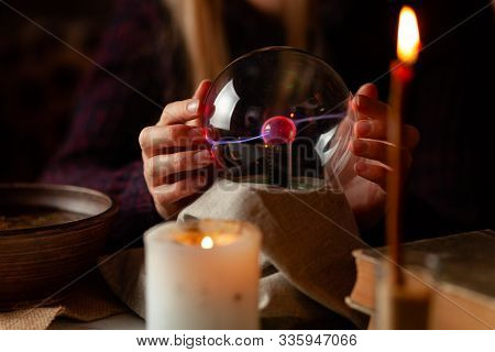 Seer With Magic Ball Performs Ritual. Psychic Vision, Fortune Teller.