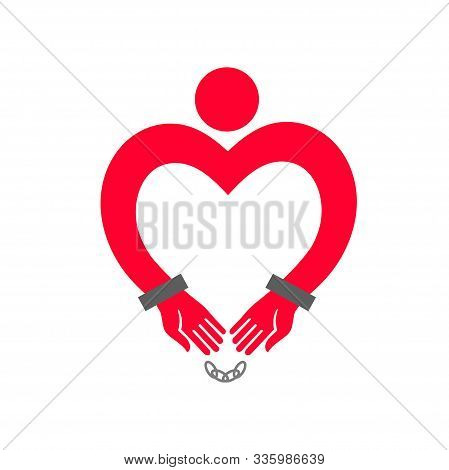 Heart In Handcuffs. A Man With Heart-shaped Hands In Handcuffs.