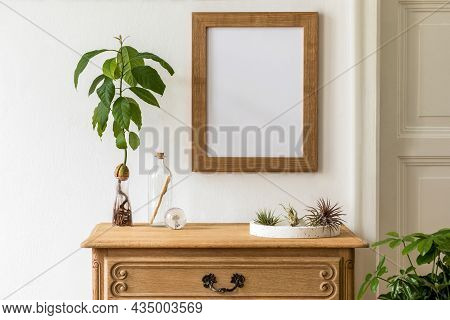 Minimalistic Compositon With Wooden Vintage Commode, Brown Mock Up Photo Frame, Avocado Plant, Air P