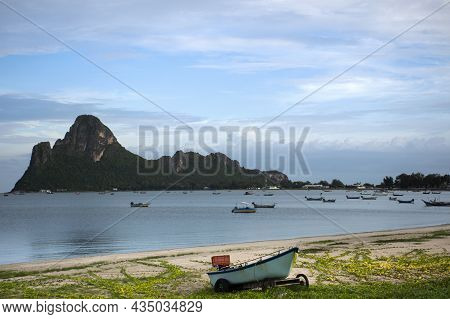View Landscape Seascape And Wooden Fishing Boat Floating In Sea Waiting Catch Fish And Marine Life W
