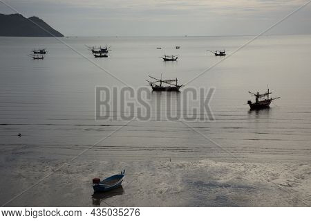 View Landscape Seascape And Wooden Fishing Boat Floating In Sea Waiting Catch Fish And Marine Life W