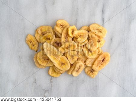 Dried Banana Chips Fried In Coconut Oil.