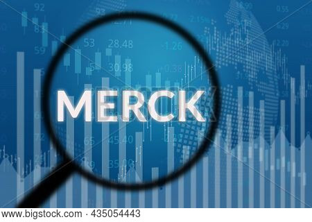 Moscow, Russia - October 04, 2021: The Name Of The Company Merck (healthcare Sector) Through Magnify