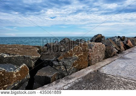 Seascape With Huge Granite Boulders On The Black Sea Coast. Coast In Blocks Of Granite
