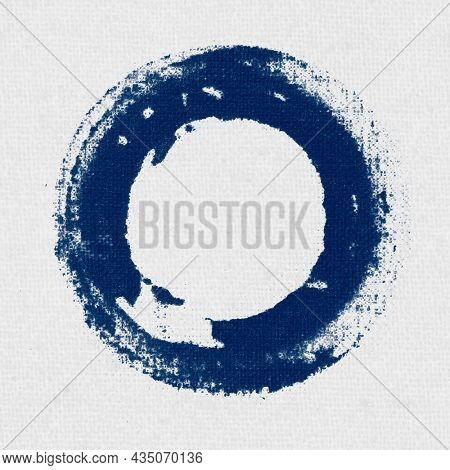 Circle stamped on white fabric