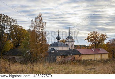 Evening Autumn Landscape With An Old Orthodox Church On The Island Of Konevets. Skete In The Name Of