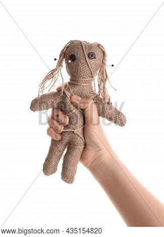 Woman Holding Voodoo Doll With Pins On White Background, Closeup. Curse Ceremony