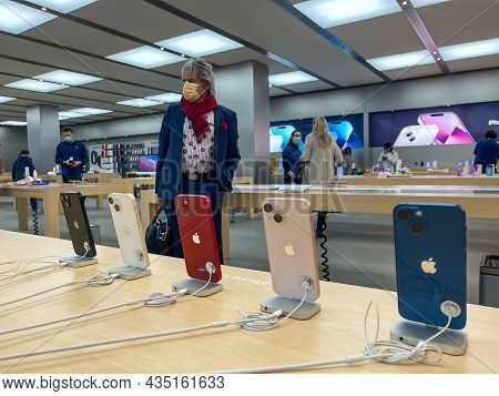 Cologne, Germany - October 01st 2021: A German Photographer Comparing And Testing The New Iphone 13 