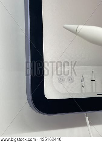 Frankfurt, Germany - October 04th 2021: A German Photographer Visiting A Saturn Market, Comparing Th