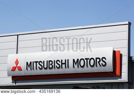 Roanne, France - May 31, 2020: Mitsubishi Motors Logo On A Wall. Mitsubishi Motors Corporation Is A 
