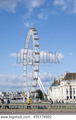 London - Aug 22,2021: The London Eye, Tourist Attraction In London City, Fair Spining Huge Wheel Con