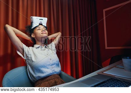 American Female Person Spending Time At Workplace