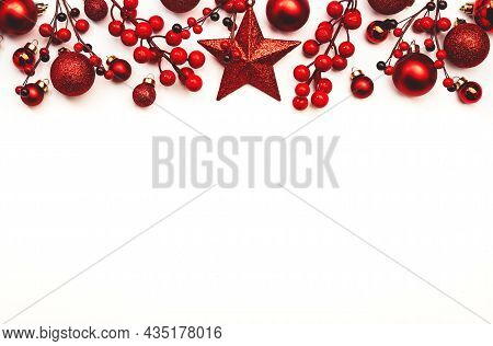 White Christmas And New Year Background With Red Christmas Balls, Big Star And Berries, Top View, Co