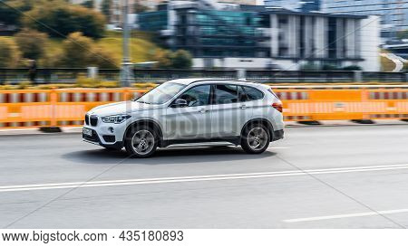 Moscow, Russia - August 2021: Bmw X1 F48 Rides On A City Road. White Crossover Car On Street In Moti