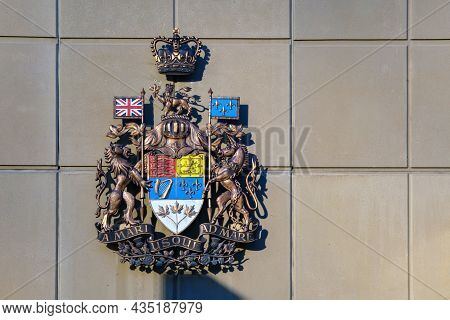 Calgary, Alberta, Canada - 1 October 2021: Arms Of Canada On The Wall Of A Building