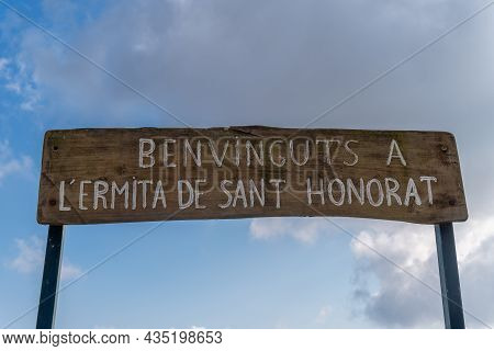 Randa, Spain; October 03 2021: Welcome Sign Of The Hermitage Of Sant Honorat Written In Catalan Lang