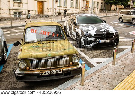 Kiev, Ukraine - June 12, 2021: Zaz And Mercedes Benz E 63 Amg Parked In The City