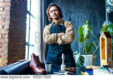 Hobby Became A Small Business Leather Man In Apron Is Making A Leather Wallet And Shooes In Studio