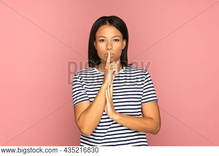 Keep Silence. Young African American Female Hold Finger On Lips Asking To Be Quiet. Serious Silent B
