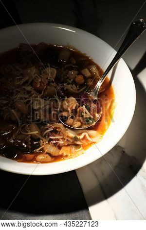 Classic Italian Minestrone Soup With Vegetables Beans And Pancetta