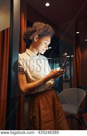 Female Person Having Break In Corridor Of Office