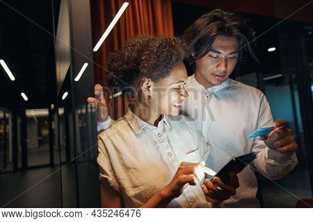 Male Person Having Break With Worker In Corridor