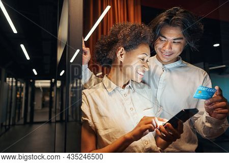 Male Person Having Break With Collegue In Corridor