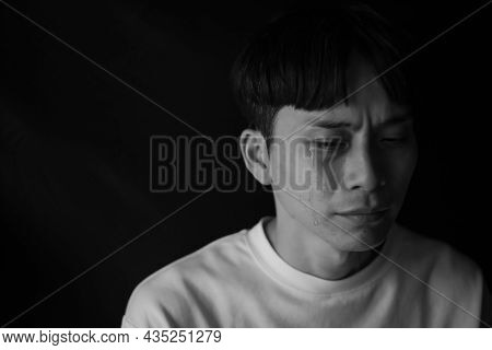 Image Of A Man Who Sheds Tears