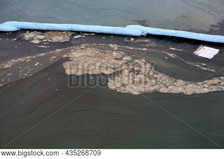 10-4-2021 Huntington Beach California: Industrial Oil Spill on the coast of Southern California in Huntington Beach causes and industrial catastrophe. Crews work to clean up as soon as possible. 