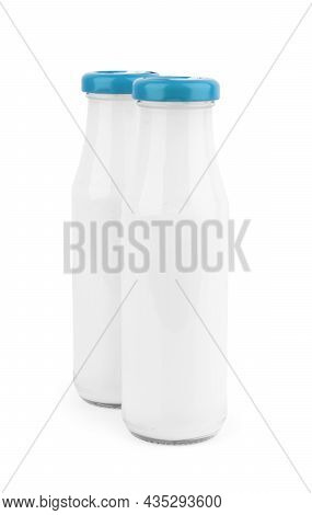 Pitcher Of Milk Isolated On White Background. Clipping Path. Glass Jug