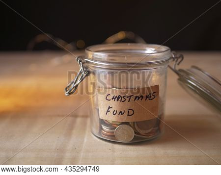 Christmas Savings Fund In Glass Jar To Buy Gifts