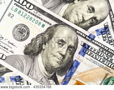 Background Of Hundred-dollar Bills. The Texture Of Hundred-dollar Bills. A Lot Of Dollars